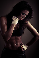 Image showing exhausted brunette after workout 