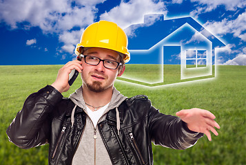 Image showing Contractor in Hard Hat in Front of Ghosted House and Grass Field