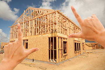 Image showing Female Hands Framing Home Frame on Construction Site