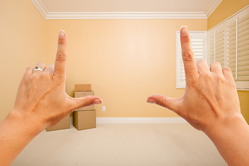 Image showing Female Hands Framing Beautiful Room Interior