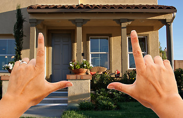 Image showing Female Hands Framing Beautiful House