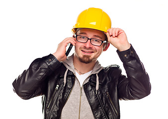 Image showing Handsome Young Man in Hard Hat on Phone