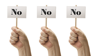 Image showing Three Signs In Fists Saying No, No and No