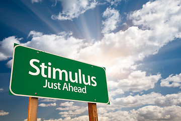 Image showing Stimulus Green Road Sign and Clouds