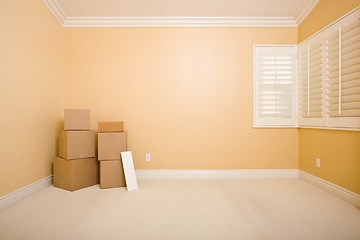 Image showing Moving Boxes and Blank Sign in Empty Room