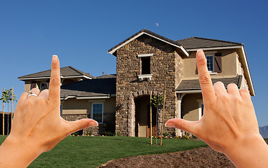 Image showing Female Hands Framing Beautiful House