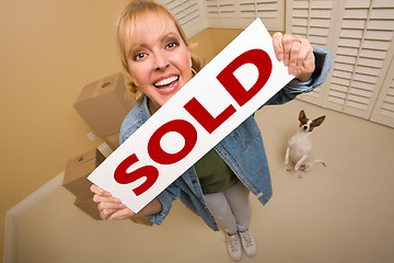 Image showing Woman and Doggy with Sold Sign Near Moving Boxes