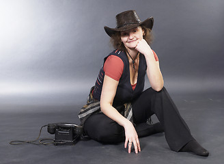 Image showing Beautiful lady in a cowboy hat