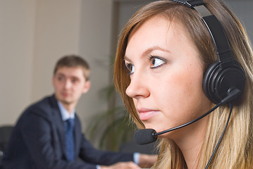 Image showing Beautiful business woman with headset