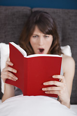 Image showing Reading a book