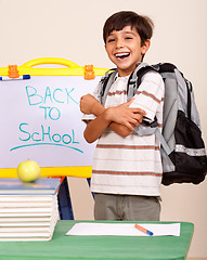 Image showing Happy student in his classroom