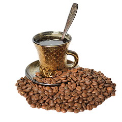 Image showing A cup of coffee and coffee beans