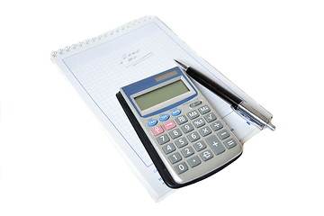 Image showing Calculator and pen in the background scheduler