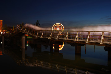 Image showing People crossing a bridge