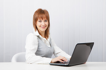 Image showing  happy girl with a laptop