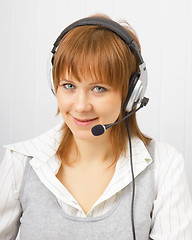 Image showing attractive girl in headphones with microphone