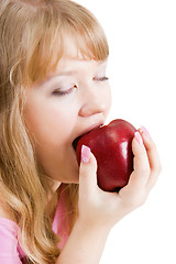 Image showing girl biting the apple