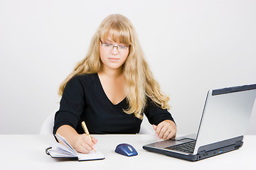 Image showing blonde girl with a laptop