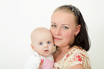 Image showing baby on his mother's arms