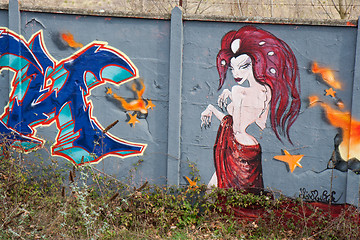 Image showing Naked woman on a graffiti