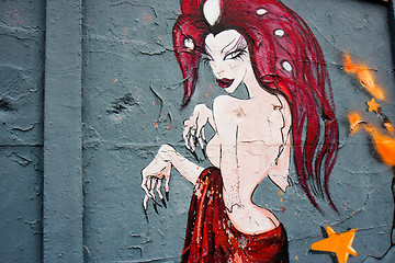 Image showing Disturbing naked woman on a graffiti