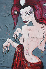 Image showing Naked woman on a graffiti