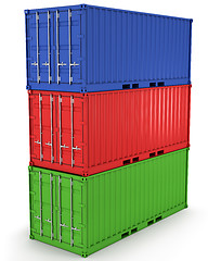 Image showing Three freight containers stacked in a tower isolated