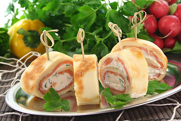Image showing Pancakes with salmon and cream cheese