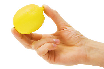 Image showing yellow lemon in male hand