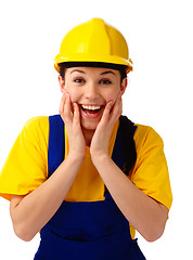 Image showing Construction girl holding her face in astonishment