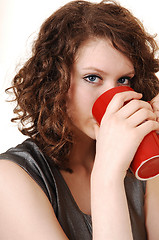 Image showing Girl thinking coffee.