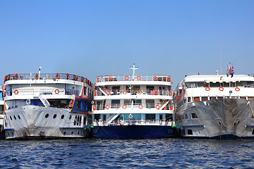 Image showing three old dirty passenger ships