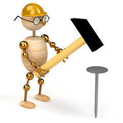 Image showing 3d wood man with a hammer