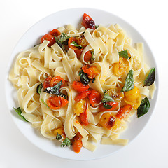 Image showing Pasta with grilled cherry tomatoes high angle