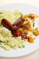 Image showing Bangers and mash vertical