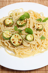 Image showing Courgettes with spaghetti and mint vertical