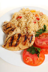 Image showing Cajun chicken and rice vertical