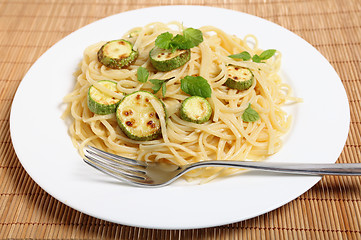 Image showing Courgettes with spaghetti and mint