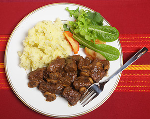 Image showing Beef Bourguignon meal from above