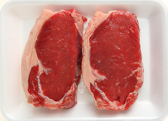 Image showing Veal sirloin steaks on tray