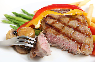 Image showing Veal sirloin steak meal cut open