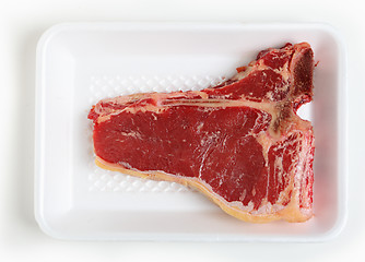 Image showing T-bone steak on a tray