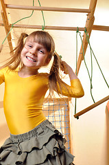 Image showing child at her home sports equipment