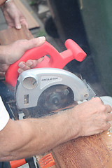 Image showing cutting wood with circular saw