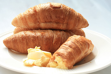 Image showing Croissants with butter