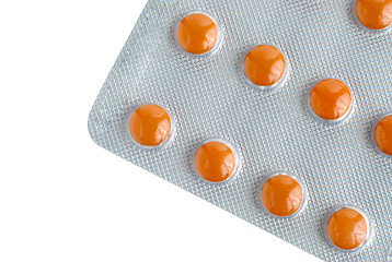 Image showing Pack of orange pills