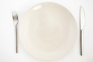 Image showing Knife, white plate and fork