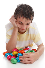 Image showing Boy with lots of easter eggs