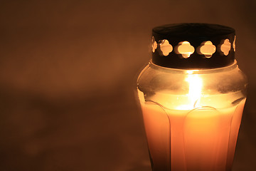 Image showing burning votive light
