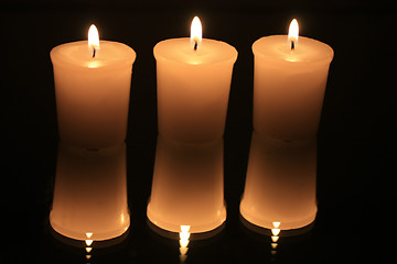 Image showing reflecting votive lights